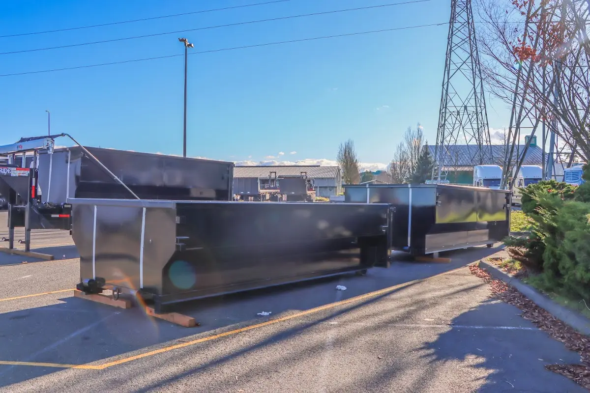 Roll-off dumpster ready for waste disposal at job site for Concrete Dumpster Rental in Monticello